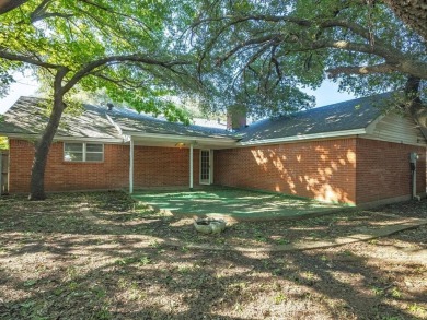 This three-bedroom, two-bathroom home is brimming with potential on Hillsboro Country Club in Texas - for sale on GolfHomes.com, golf home, golf lot