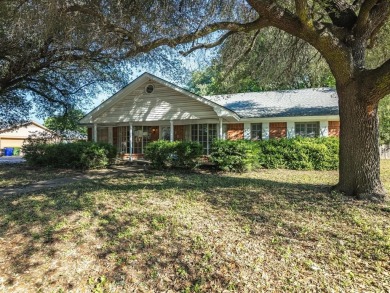 This three-bedroom, two-bathroom home is brimming with potential on Hillsboro Country Club in Texas - for sale on GolfHomes.com, golf home, golf lot