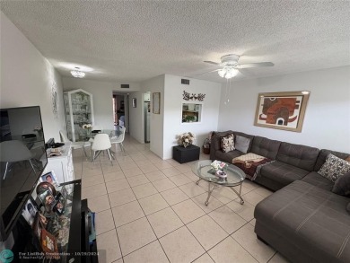 Remarkable 55+ Community, Sunrise Lakes Phase 3, offers a fully on Sunrise Lakes Phase III in Florida - for sale on GolfHomes.com, golf home, golf lot