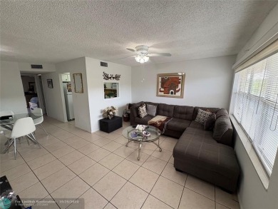 Remarkable 55+ Community, Sunrise Lakes Phase 3, offers a fully on Sunrise Lakes Phase III in Florida - for sale on GolfHomes.com, golf home, golf lot