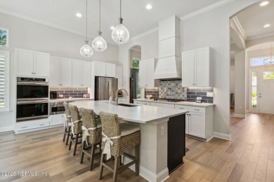 PRICED TO SELL! Nestled on a corner lot, welcome to luxury on Amelia National Golf and Country Club in Florida - for sale on GolfHomes.com, golf home, golf lot