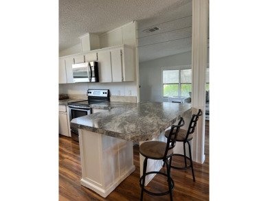 Located within a short walking distance to the on Pine Lakes Country Club in Florida - for sale on GolfHomes.com, golf home, golf lot