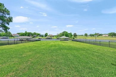 Discover the perfect blend of comfort, elegance, and outdoor on Lake Kiowa Golf Course in Texas - for sale on GolfHomes.com, golf home, golf lot