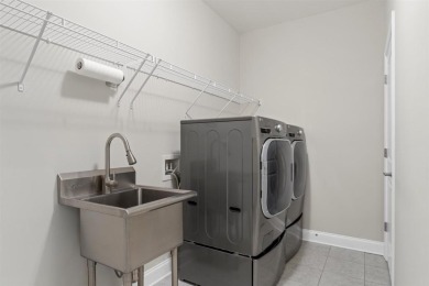 IF YOU EVER WANTED TO LIVE IN AN ELEGANT MODEL HOME W/BEAUTIFUL on The Governors Towne Club in Georgia - for sale on GolfHomes.com, golf home, golf lot