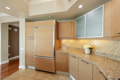 A stunning corner residence with floor-to-ceiling windows on Las Vegas Country Club in Nevada - for sale on GolfHomes.com, golf home, golf lot
