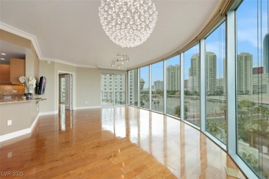 A stunning corner residence with floor-to-ceiling windows on Las Vegas Country Club in Nevada - for sale on GolfHomes.com, golf home, golf lot