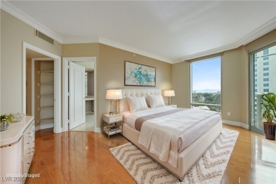 A stunning corner residence with floor-to-ceiling windows on Las Vegas Country Club in Nevada - for sale on GolfHomes.com, golf home, golf lot