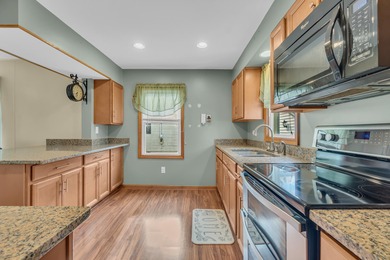 Situated in popular subdivision close to Cascades Park & Golf on Cascades Golf Course in Michigan - for sale on GolfHomes.com, golf home, golf lot