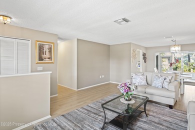 Step into this bright and inviting home featuring a formal on Timber Pines Golf Course in Florida - for sale on GolfHomes.com, golf home, golf lot