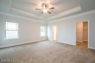Welcome to your dream home at 1132 Coral Reef Drive in the on Harbour Point Golf Club in North Carolina - for sale on GolfHomes.com, golf home, golf lot