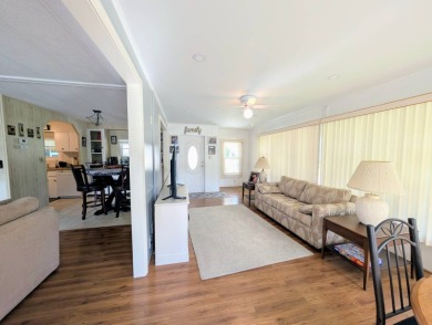WELCOME TO YOUR NEW FLORIDA HOME WITH CARE-FREE LIVING!  This on Grasslands Golf and Country Club in Florida - for sale on GolfHomes.com, golf home, golf lot