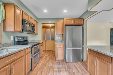 Situated in popular subdivision close to Cascades Park & Golf on Cascades Golf Course in Michigan - for sale on GolfHomes.com, golf home, golf lot