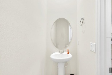 This Atria at Ridgewood Lakes contemporary two-story townhome is on Ridgewood Lakes Golf and Country Club in Florida - for sale on GolfHomes.com, golf home, golf lot