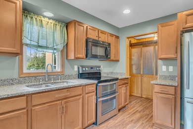 Situated in popular subdivision close to Cascades Park & Golf on Cascades Golf Course in Michigan - for sale on GolfHomes.com, golf home, golf lot