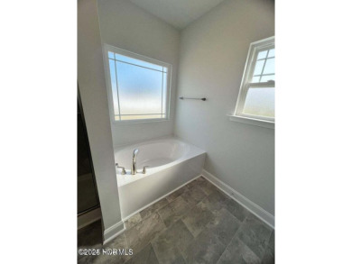 Welcome to your dream home at 1132 Coral Reef Drive in the on Harbour Point Golf Club in North Carolina - for sale on GolfHomes.com, golf home, golf lot