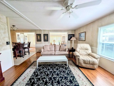 WELCOME TO YOUR NEW FLORIDA HOME WITH CARE-FREE LIVING!  This on Grasslands Golf and Country Club in Florida - for sale on GolfHomes.com, golf home, golf lot
