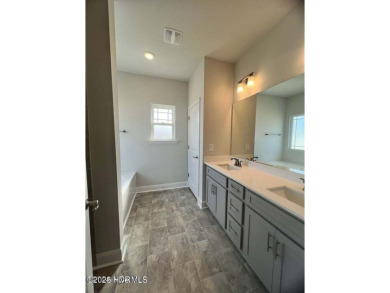 Welcome to your dream home at 1132 Coral Reef Drive in the on Harbour Point Golf Club in North Carolina - for sale on GolfHomes.com, golf home, golf lot