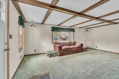 Situated in popular subdivision close to Cascades Park & Golf on Cascades Golf Course in Michigan - for sale on GolfHomes.com, golf home, golf lot