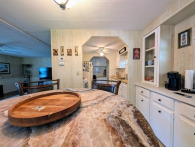 WELCOME TO YOUR NEW FLORIDA HOME WITH CARE-FREE LIVING!  This on Grasslands Golf and Country Club in Florida - for sale on GolfHomes.com, golf home, golf lot