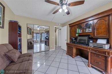 Priced to sell! Large Corner Unit! 2 bedroom/ 2 bathrooms, Lake on Flamingo Lakes Country Club in Florida - for sale on GolfHomes.com, golf home, golf lot