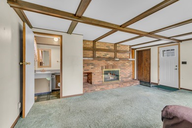 Situated in popular subdivision close to Cascades Park & Golf on Cascades Golf Course in Michigan - for sale on GolfHomes.com, golf home, golf lot