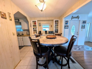 WELCOME TO YOUR NEW FLORIDA HOME WITH CARE-FREE LIVING!  This on Grasslands Golf and Country Club in Florida - for sale on GolfHomes.com, golf home, golf lot