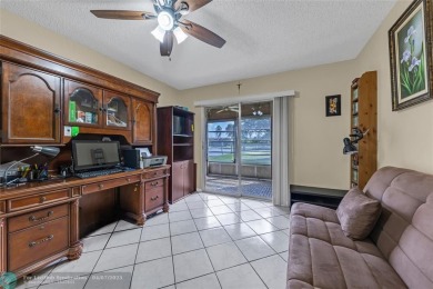 Priced to sell! Large Corner Unit! 2 bedroom/ 2 bathrooms, Lake on Flamingo Lakes Country Club in Florida - for sale on GolfHomes.com, golf home, golf lot