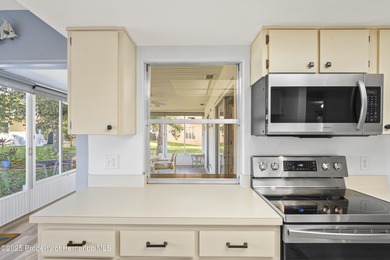 Step into this bright and inviting home featuring a formal on Timber Pines Golf Course in Florida - for sale on GolfHomes.com, golf home, golf lot