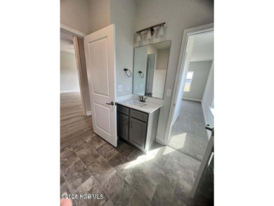 Welcome to your dream home at 1132 Coral Reef Drive in the on Harbour Point Golf Club in North Carolina - for sale on GolfHomes.com, golf home, golf lot