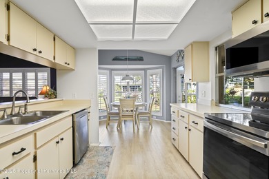 Step into this bright and inviting home featuring a formal on Timber Pines Golf Course in Florida - for sale on GolfHomes.com, golf home, golf lot