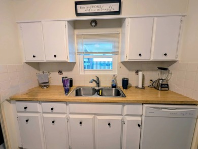 WELCOME TO YOUR NEW FLORIDA HOME WITH CARE-FREE LIVING!  This on Grasslands Golf and Country Club in Florida - for sale on GolfHomes.com, golf home, golf lot