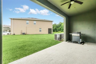 This Atria at Ridgewood Lakes contemporary two-story townhome is on Ridgewood Lakes Golf and Country Club in Florida - for sale on GolfHomes.com, golf home, golf lot