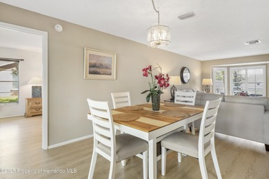 Step into this bright and inviting home featuring a formal on Timber Pines Golf Course in Florida - for sale on GolfHomes.com, golf home, golf lot