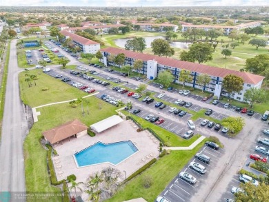 Priced to sell! Large Corner Unit! 2 bedroom/ 2 bathrooms, Lake on Flamingo Lakes Country Club in Florida - for sale on GolfHomes.com, golf home, golf lot
