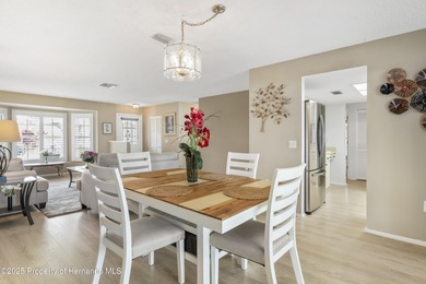 Step into this bright and inviting home featuring a formal on Timber Pines Golf Course in Florida - for sale on GolfHomes.com, golf home, golf lot