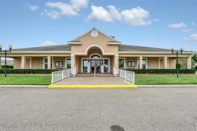 This Atria at Ridgewood Lakes contemporary two-story townhome is on Ridgewood Lakes Golf and Country Club in Florida - for sale on GolfHomes.com, golf home, golf lot