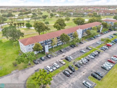 Priced to sell! Large Corner Unit! 2 bedroom/ 2 bathrooms, Lake on Flamingo Lakes Country Club in Florida - for sale on GolfHomes.com, golf home, golf lot