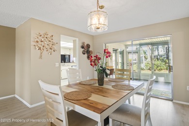 Step into this bright and inviting home featuring a formal on Timber Pines Golf Course in Florida - for sale on GolfHomes.com, golf home, golf lot