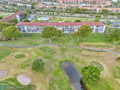 Priced to sell! Large Corner Unit! 2 bedroom/ 2 bathrooms, Lake on Flamingo Lakes Country Club in Florida - for sale on GolfHomes.com, golf home, golf lot