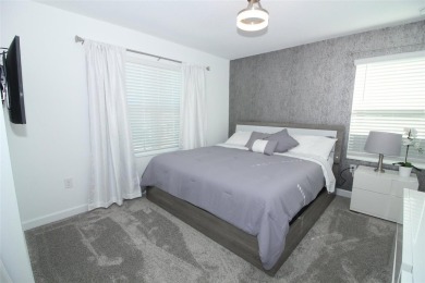 Corner Townhouse in ChampionsGate - 5 Beds | 4 Baths | Private on ChampionsGate Golf Resort in Florida - for sale on GolfHomes.com, golf home, golf lot