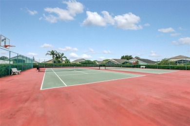 This Atria at Ridgewood Lakes contemporary two-story townhome is on Ridgewood Lakes Golf and Country Club in Florida - for sale on GolfHomes.com, golf home, golf lot