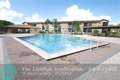 Priced to sell! Large Corner Unit! 2 bedroom/ 2 bathrooms, Lake on Flamingo Lakes Country Club in Florida - for sale on GolfHomes.com, golf home, golf lot