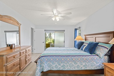 Step into this bright and inviting home featuring a formal on Timber Pines Golf Course in Florida - for sale on GolfHomes.com, golf home, golf lot