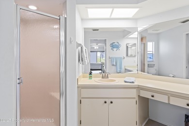 Step into this bright and inviting home featuring a formal on Timber Pines Golf Course in Florida - for sale on GolfHomes.com, golf home, golf lot