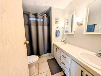 WELCOME TO YOUR NEW FLORIDA HOME WITH CARE-FREE LIVING!  This on Grasslands Golf and Country Club in Florida - for sale on GolfHomes.com, golf home, golf lot