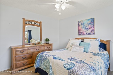 Step into this bright and inviting home featuring a formal on Timber Pines Golf Course in Florida - for sale on GolfHomes.com, golf home, golf lot