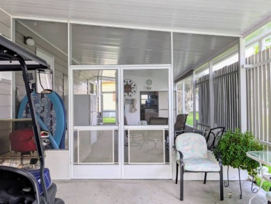 WELCOME TO YOUR NEW FLORIDA HOME WITH CARE-FREE LIVING!  This on Grasslands Golf and Country Club in Florida - for sale on GolfHomes.com, golf home, golf lot