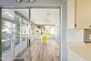 Step into this bright and inviting home featuring a formal on Timber Pines Golf Course in Florida - for sale on GolfHomes.com, golf home, golf lot