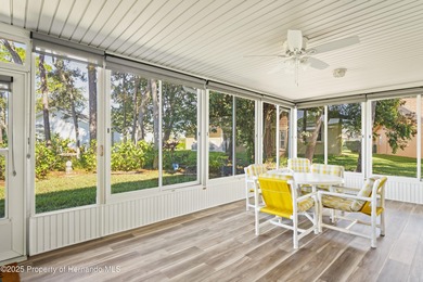 Step into this bright and inviting home featuring a formal on Timber Pines Golf Course in Florida - for sale on GolfHomes.com, golf home, golf lot