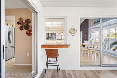 Step into this bright and inviting home featuring a formal on Timber Pines Golf Course in Florida - for sale on GolfHomes.com, golf home, golf lot